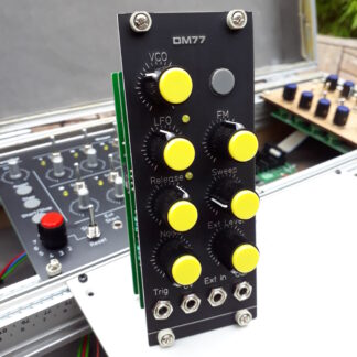 DM77